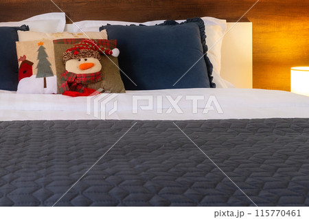 Christmas snowman Pillow, bedroom, close-up 115770461