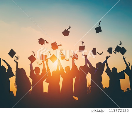 A joyful scene of graduates tossing caps under the setting sun 115772126