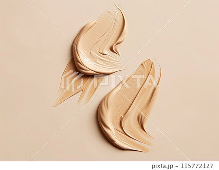 Four strokes of pink cream swirl elegantly across a soft pink backdrop 115772127