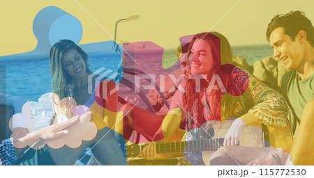 Image of colourful puzzle pieces over happy friends at summer beach party Image of colourful puzzle pieces over happy friends at summer beach party 115772530