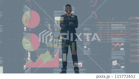 Image of financial data over happy african american businessman Image of financial data over happy african american businessman 115772652