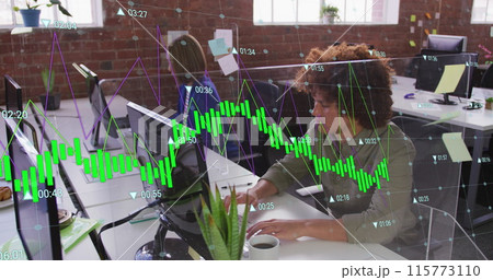 Image of multiple graphs with changing numbers over biracial man working on computer in office Image of multiple graphs with changing numbers over biracial man working on computer in office 115773110