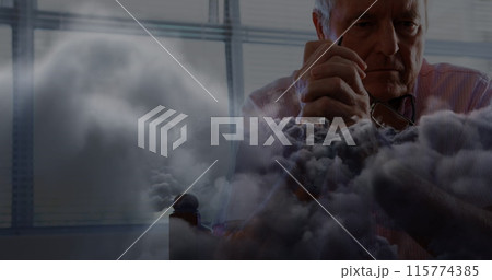 Image of clouds over sad senior caucasian man Image of clouds over sad senior caucasian man 115774385