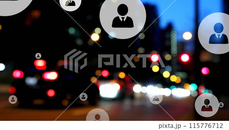 Image of profile icons over blurred vehicles stopped on red signal in street of city 115776712