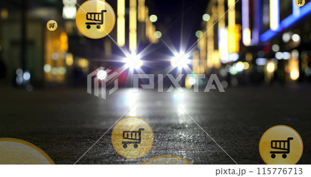 Image of shopping cart icons over low angle view of car moving on street in city 115776713