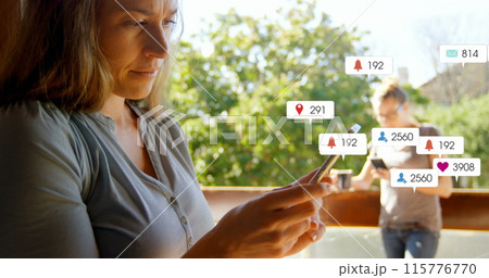 Image of notification bars over caucasian woman scrolling on smartphone at home 115776770
