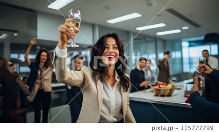 Coworkers celebrating a successful business quarter with drinks 115777799