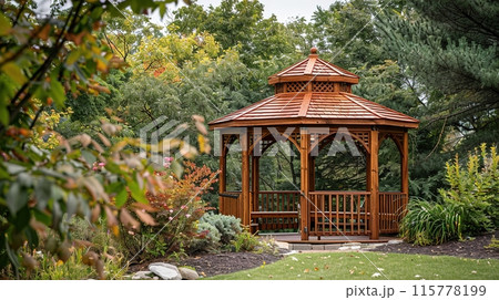 Wooden gazebo for relaxing in the garden 115778199