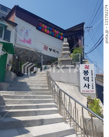a small house on a construction site a small house on a construction site 115782274