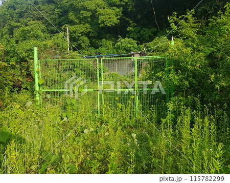 a small house on a construction site a small house on a construction site 115782299