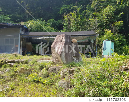 a small house on a construction site 115782308