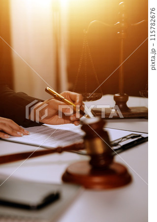 Law theme, gavel or mallet of the judge, lawyer enforcement officers, evidence-based cases taken into account in the court abount business, legislation. 115782676