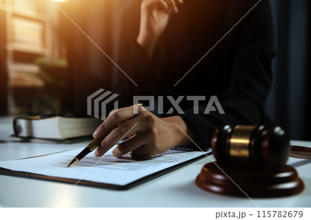 Law theme, gavel or mallet of the judge, lawyer enforcement officers, evidence-based cases taken into account in the court abount business, legislation. 115782679