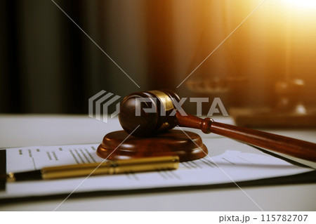 Law theme, gavel or mallet of the judge, lawyer enforcement officers, evidence-based cases taken into account in the court abount business, legislation. 115782707