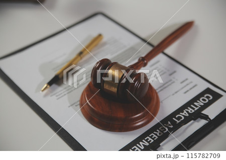 Law theme, gavel or mallet of the judge, lawyer enforcement officers, evidence-based cases taken into account in the court abount business, legislation. Law theme, gavel or mallet of the judge, lawyer enforcement officers, evidence-based cases taken into account in the court abount business, legislation. 115782709