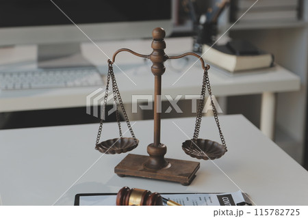 Law theme, gavel or mallet of the judge, lawyer enforcement officers, evidence-based cases taken into account in the court abount business, legislation. Law theme, gavel or mallet of the judge, lawyer enforcement officers, evidence-based cases taken into account in the court abount business, legislation. 115782725