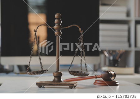 Law theme, gavel or mallet of the judge, lawyer enforcement officers, evidence-based cases taken into account in the court abount business, legislation. Law theme, gavel or mallet of the judge, lawyer enforcement officers, evidence-based cases taken into account in the court abount business, legislation. 115782738