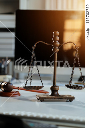 Law theme, gavel or mallet of the judge, lawyer enforcement officers, evidence-based cases taken into account in the court abount business, legislation. 115782739