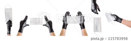 Hand in black gloves wearing disposable face mask isolated on white background Hand in black gloves wearing disposable face mask isolated on white background 115783956