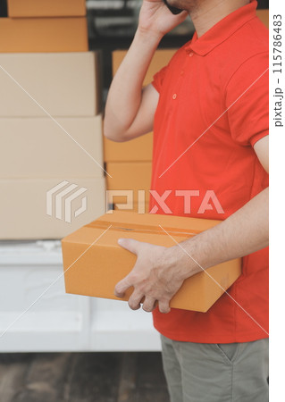 Asian delivery express courier young man use giving boxes to woman customer he wearing protective face mask at front home Asian delivery express courier young man use giving boxes to woman customer he wearing protective face mask at front home 115786483