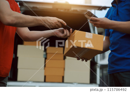 Asian delivery express courier young man use giving boxes to woman customer he wearing protective face mask at front home Asian delivery express courier young man use giving boxes to woman customer he wearing protective face mask at front home 115786492