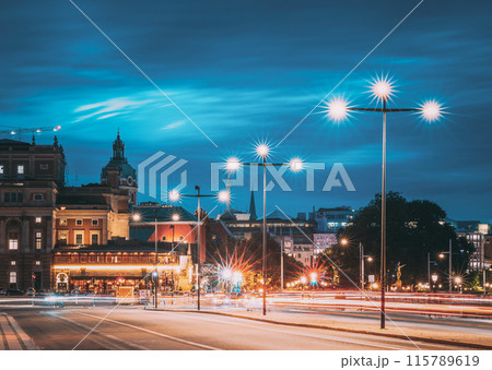Stockholm, Sweden. Scenic Skyline View Of Famous Tower Of Stockholm City Hall And St. Clara Or Saint Klara Church. Popular Destination Scenic View In Sunset Twilight Dusk Lights. Evening Lighting 115789619