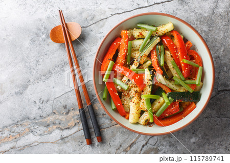 Zucchini And Bell Pepper Stir Fry closeup on the plate. Horizontal top view Zucchini And Bell Pepper Stir Fry closeup on the plate. Horizontal top view 115789741