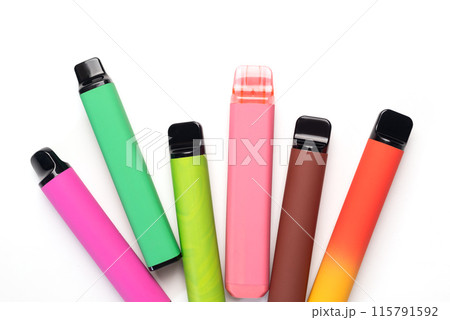A set of colorful disposable electronic cigarettes of different shapes on a white background. modern smoking.  115791592