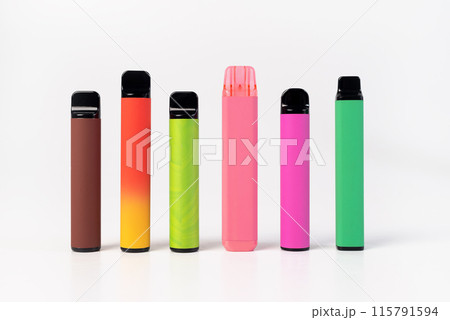 A set of colorful disposable electronic cigarettes of different shapes on a white background. modern smoking.  115791594