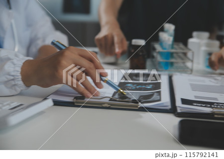 Group of professional medical doctor team meeting training medical in uniform working discussing and talk with patients record, teaching medic team, sit in hospital.health medical care concept 115792141