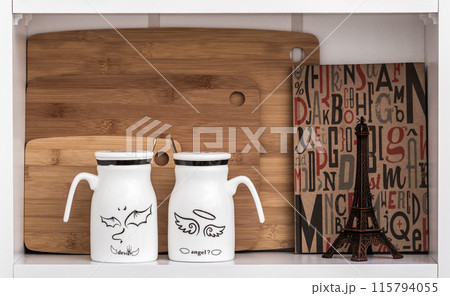 Big White Mugs with Spoon and Angel Design on White Shelf Big White Mugs with Spoon and Angel Design on White Shelf 115794055