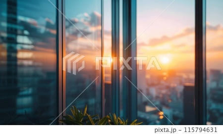 Urban Skyline Sunset Reflection on Modern Glass Skyscraper with Plant in Foreground Urban Skyline Sunset Reflection on Modern Glass Skyscraper with Plant in Foreground 115794631