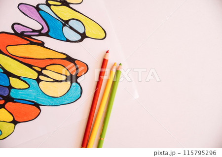 Neurographic drawing colored with colored pencils on white paper 115795296