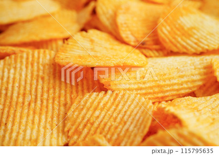 Potato chips , delicious BBQ seasoning spicy for crips, thin slice deep fried snack fast food. 115795635