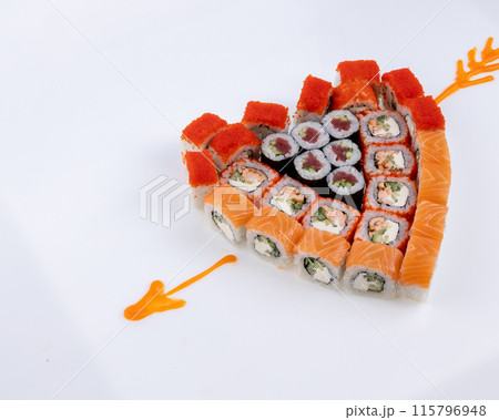 Heart shaped set of sushi rolls for Valentine's Day. Menu or delivery concept, Top view 115796948