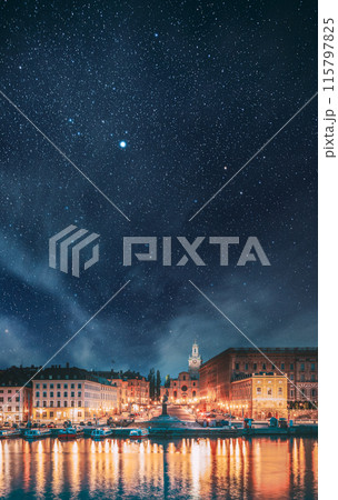 Stockholm, Sweden. Scenic Famous View Of Embankment In Old Town Of Stockholm In Night Lights. Great Church Or Church Of St. Nicholas And Royal Palace. Famous Popular Destination Scenic Place In Light 115797825