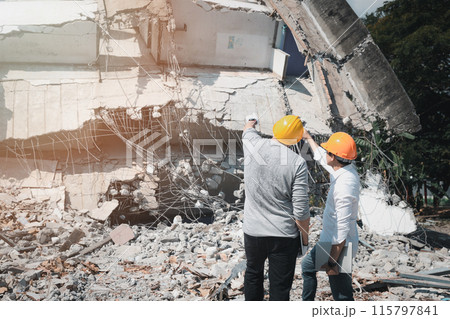 Demolition control supervisor and contractor discussing on demolish building. Demolition control supervisor and contractor discussing on demolish building. 115797841