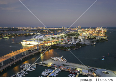 Miami marina bay with luxury sailboats. Expensive yachts and motorboats docked in Biscayne Bay harbor in Brickell downtown 115800720