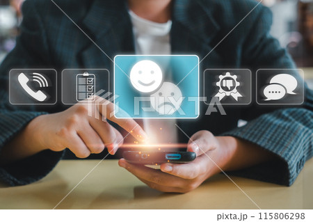 Customer Service Complaint Concept - Person Using Smartphone with Feedback Icons - Happy, Neutral, and Sad Faces - Business Communication and Customer Satisfaction Customer Service Complaint Concept - Person Using Smartphone with Feedback Icons - Happy, Neutral, and Sad Faces - Business Communication and Customer Satisfaction 115806298