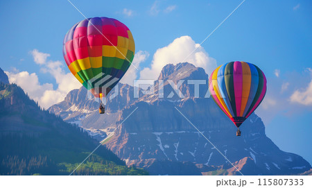 Colorful hot air balloons flying over beautiful mountain. 115807333