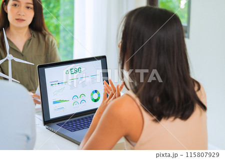 diversity team brainstorming discussion focused on ESG (environment,social,governance)  for sdgs goals in a sustainable green office 115807929