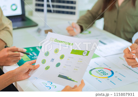 close up diversity team brainstorming focused on ESG (environment,social,governance) for sdgs goals in a sustainable green office close up diversity team brainstorming focused on ESG (environment,social,governance) for sdgs goals in a sustainable green office 115807931