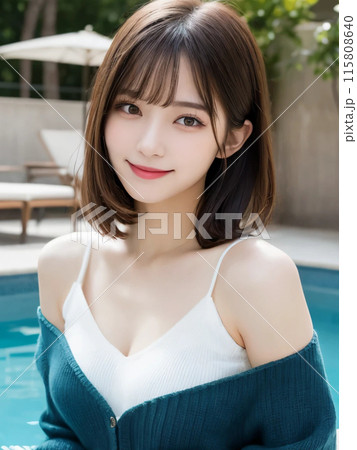 プールで優しく微笑むミディアムヘアの女性 115808640