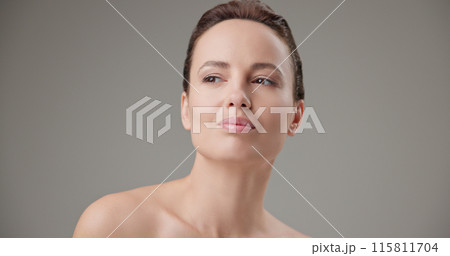 Beauty, health, cosmetics, anti-aging therapy and skin care concept - young beautiful brunette Caucasian woman standing in front of the camera and posing Beauty, health, cosmetics, anti-aging therapy and skin care concept - young beautiful brunette Caucasian woman standing in front of the camera and posing 115811704