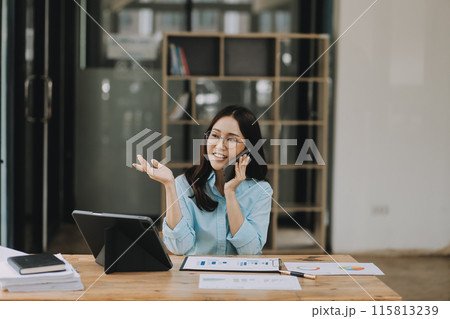 Asian woman working at the office. woman using laptop computer on desk at office 115813239