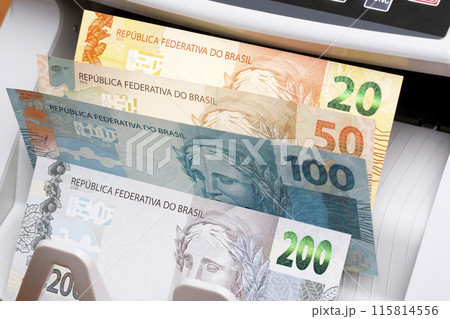 Brazilian real in the counting machine Brazilian real in the counting machine 115814556