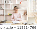 Young woman sitting at computer desk working, Smiling young man ready for work at the start of the week, Work for home. 115814766