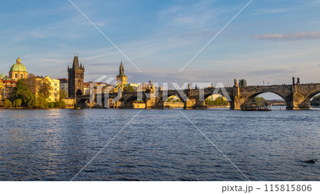 Charles Bridge in Prague in beautiful light at sunset. Charles Bridge in Prague in beautiful light at sunset. 115815806