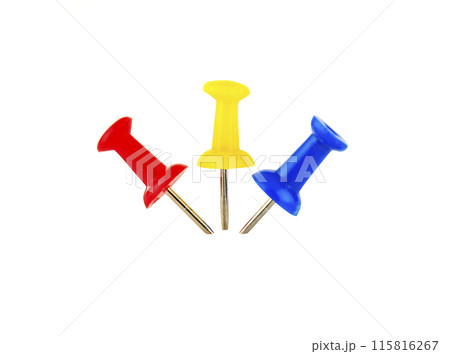 Three thumbtacks on a white background 115816267