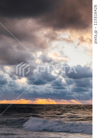 Beautiful landscape storm on sea and sunset with clouds Beautiful landscape storm on sea and sunset with clouds 115816426